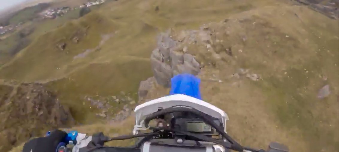 Adrian Owen rides off cliff